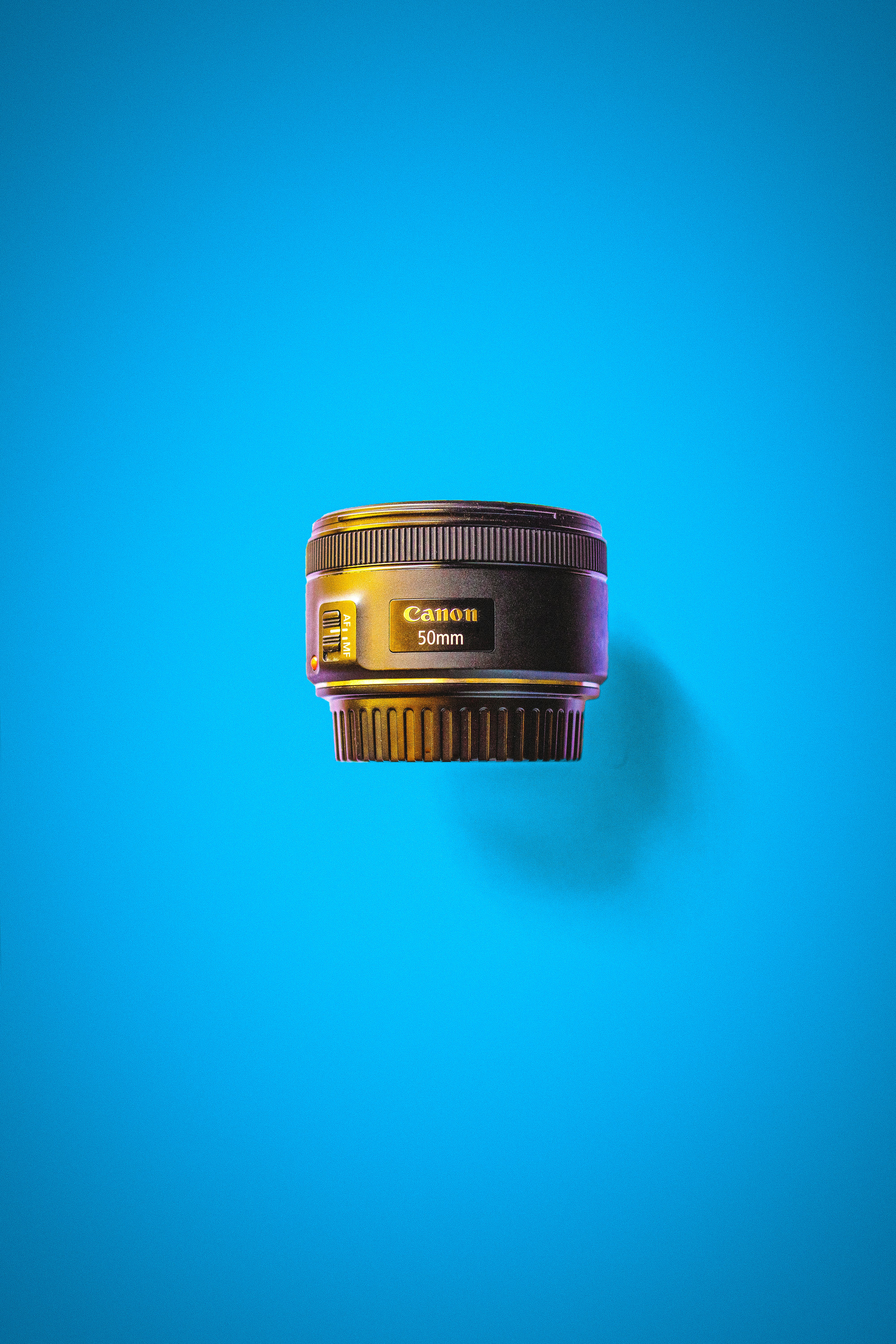 black and gold camera lens